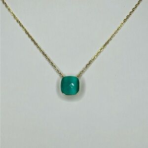 GREEN JADE PENDANT ON 14K GOLD AND STERLING SILVER CHAIN